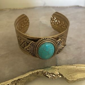 Gold Bangle with Aquamarine Stone